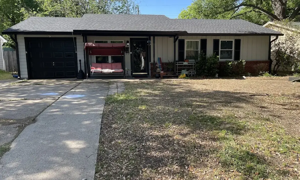 Asphalt Shingle Roof Repair crew at work on a residential roof in Lakeland Village